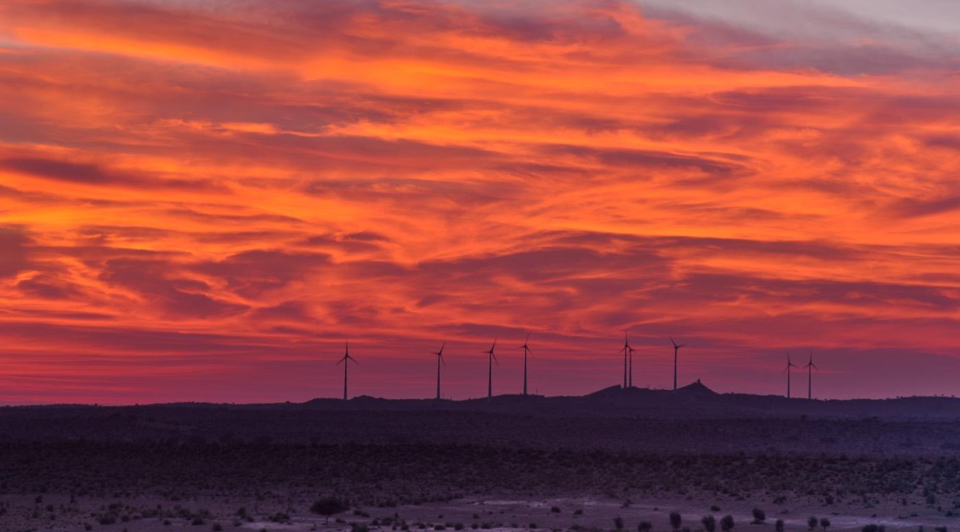 The sun setting over dunes in the Thar Desert, Rajasthan.