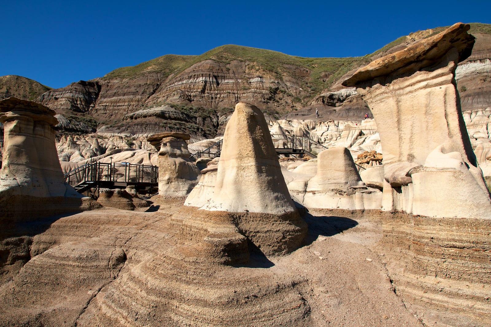 The Drumheller hoodoos with the visitor walkway that runs among them, Alberta.