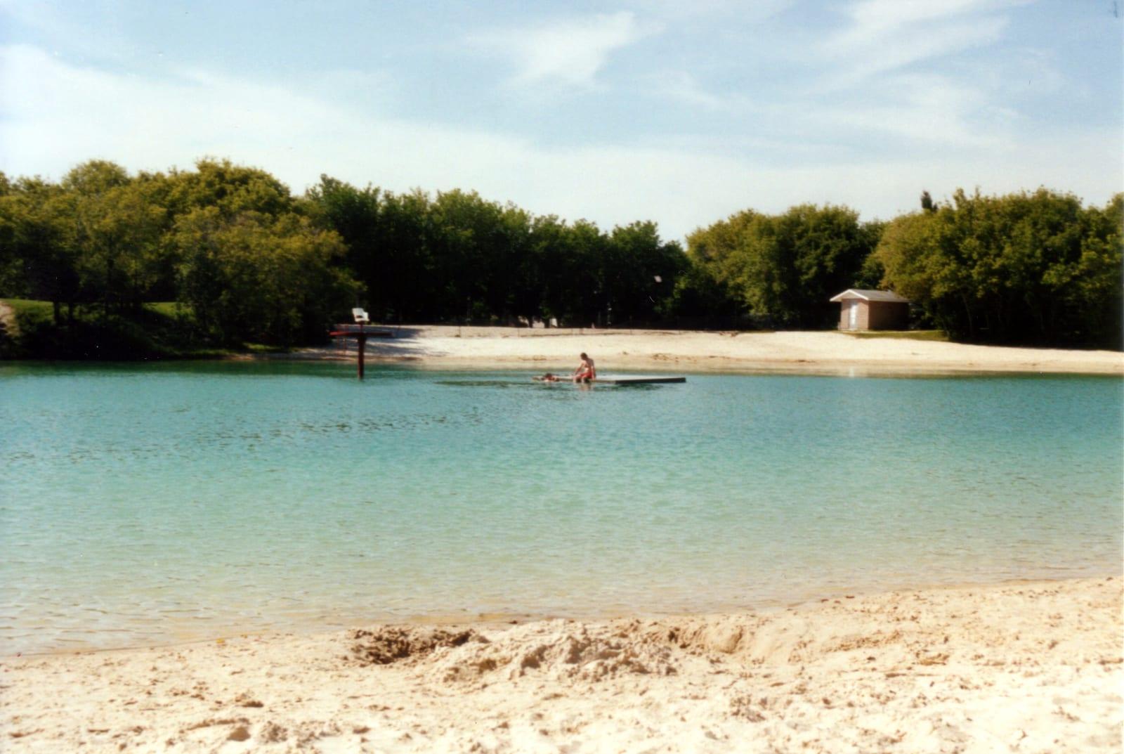 Kinsmen Lake in the flooded quarry at Stonewall Quarry Park, Manitoba.