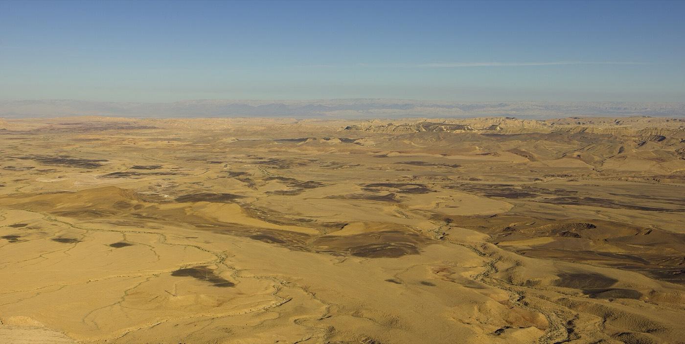 Aerial view over Makhtesh Ramon, the closed erosional valley ringed by cliffs
