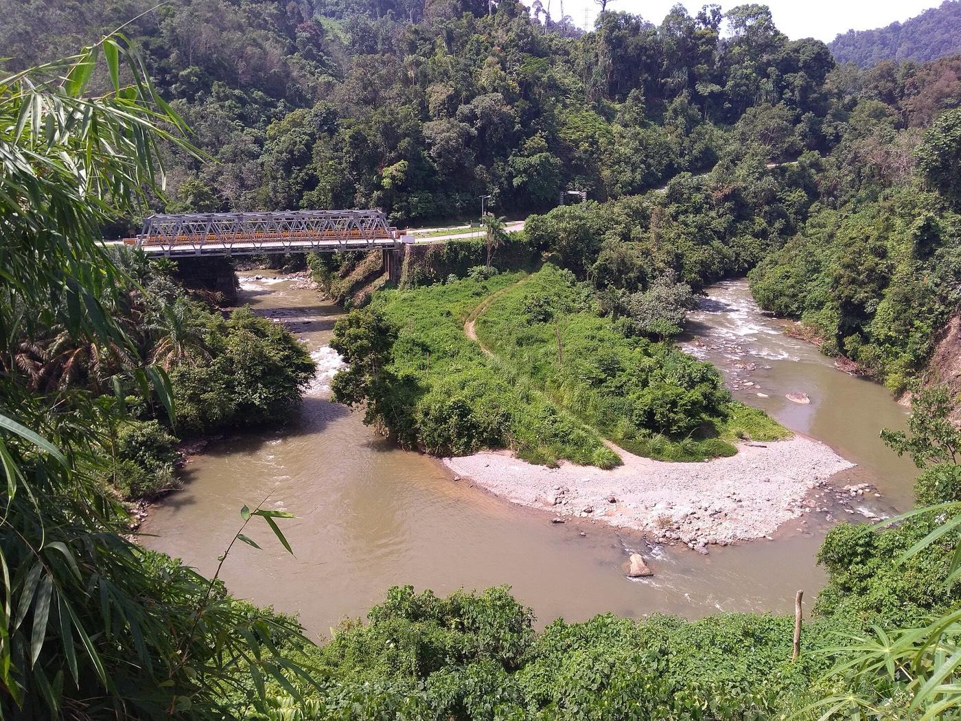 The Penetai river running through forest at the edge of Merangin regency, Sumatra