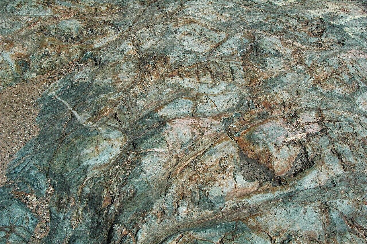 Glacially smoothed Archean pillow lava, the rounded pillow forms outlined across a polished rock surface