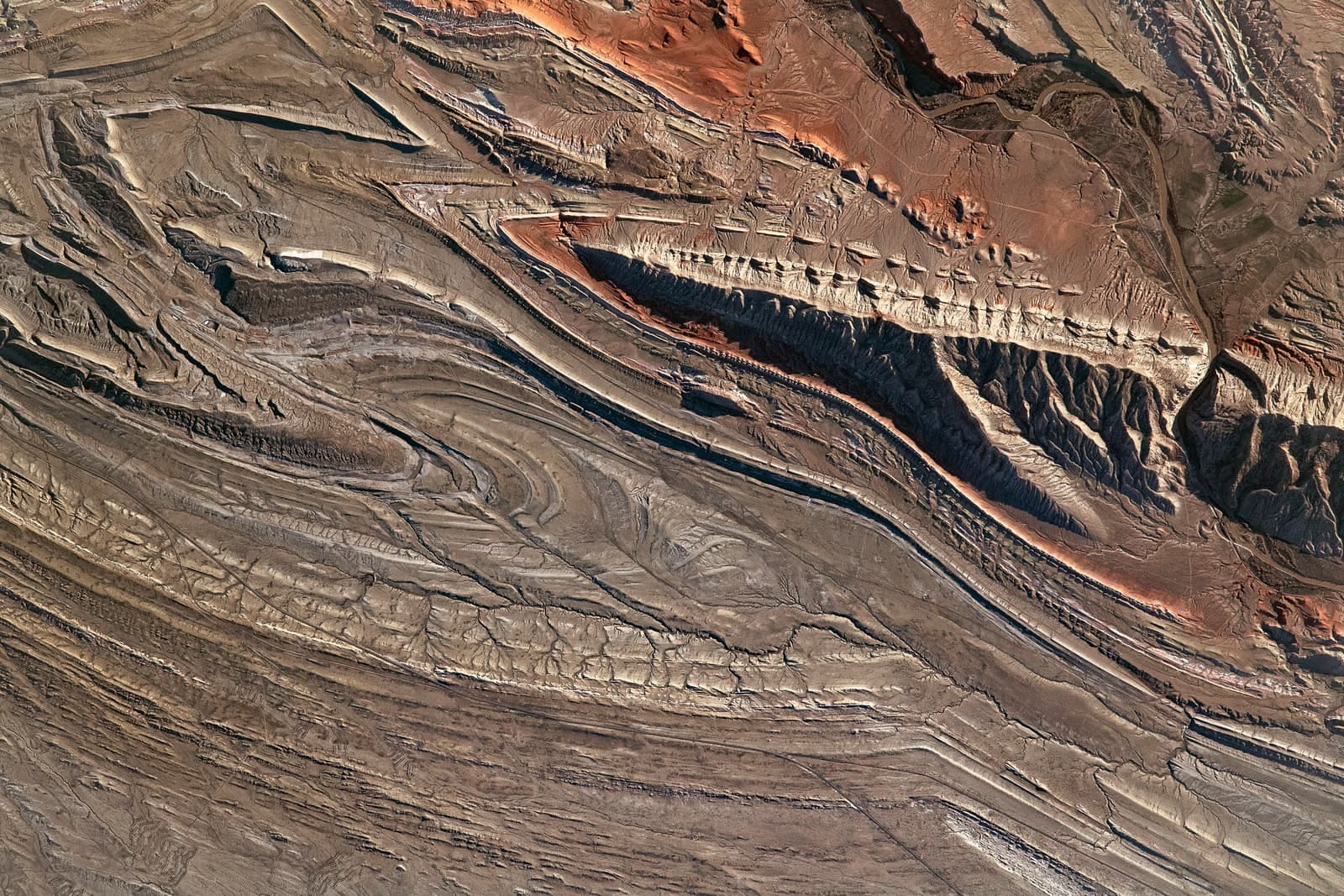 Satellite view of the folded, tilted sedimentary rock strata of the Bighorn Basin, Wyoming.